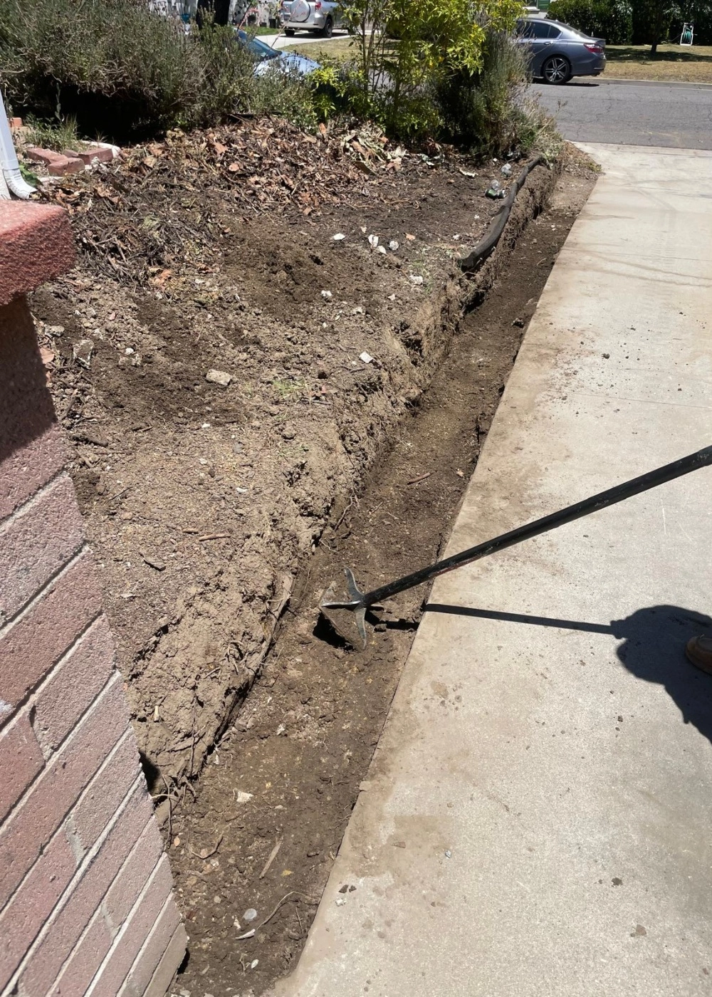 Cali Shine Expert Demolition in Los Angeles. A powerful shot of heavy machinery safely and efficiently carrying out a controlled structural or interior demolition project in a Southern California setting.