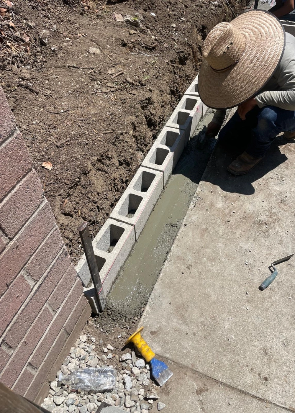 Cali Shine Expert Demolition in Los Angeles. A powerful shot of heavy machinery safely and efficiently carrying out a controlled structural or interior demolition project in a Southern California setting.