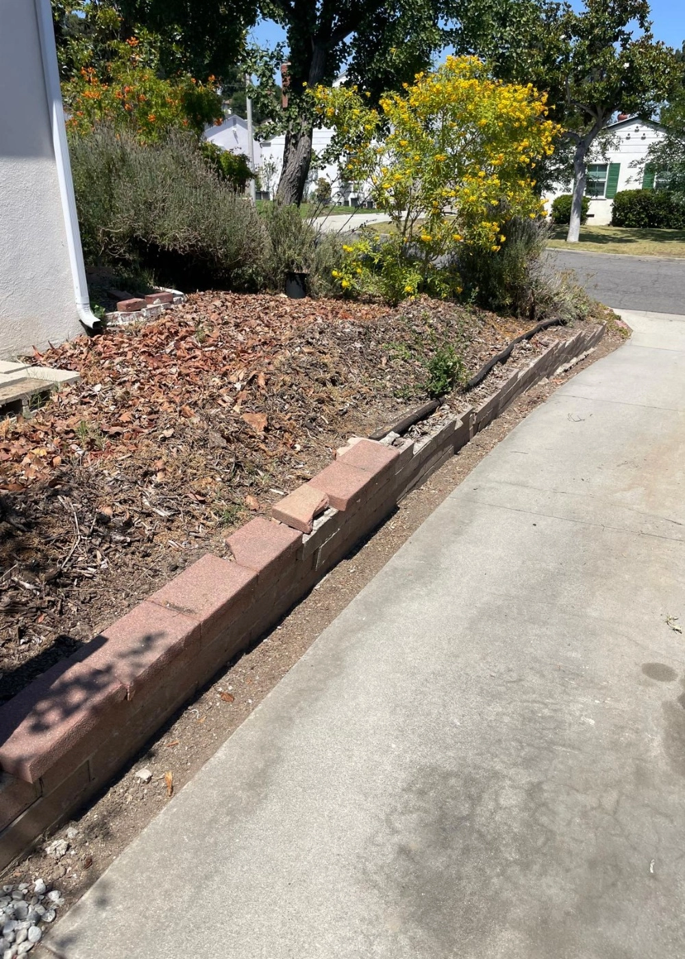 Cali Shine Expert Demolition in Los Angeles. A powerful shot of heavy machinery safely and efficiently carrying out a controlled structural or interior demolition project in a Southern California setting.