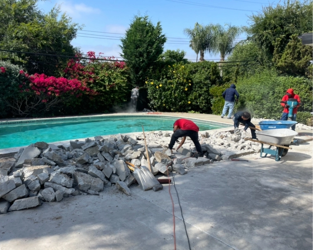 Cali Shine Expert Demolition in Los Angeles. A powerful shot of heavy machinery safely and efficiently carrying out a controlled structural or interior demolition project in a Southern California setting.